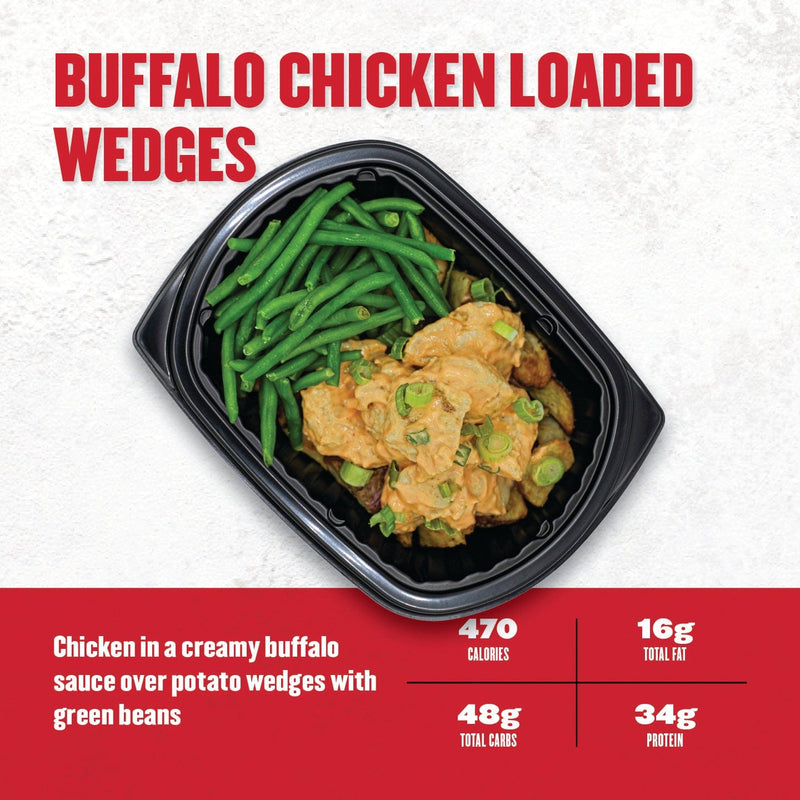 Clean Eatz Buffalo Chicken Loaded Wedges with creamy buffalo chicken over roasted potato wedges and green beans—470 calories and 34g protein.