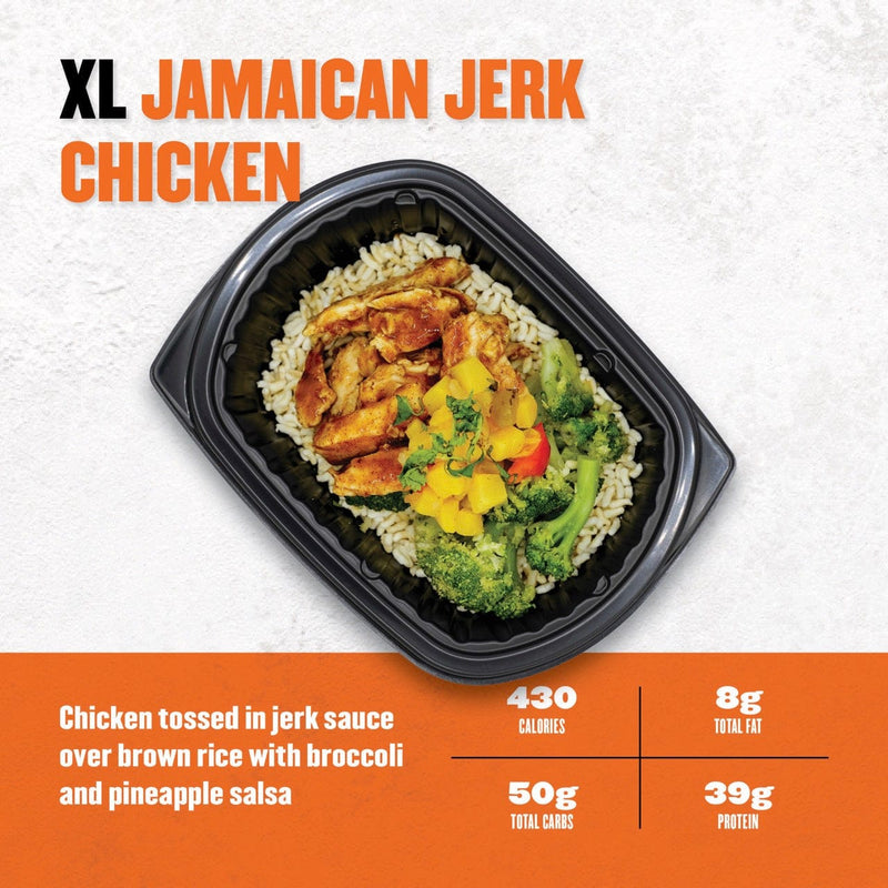 Clean Eatz XL Jamaican Jerk Chicken featuring jerk-seasoned chicken over brown rice with broccoli and pineapple salsa—flavorful island-inspired meal with 39g protein.