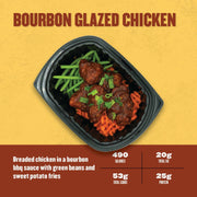 Bourbon Glazed Chicken – breaded chicken tossed in bourbon BBQ sauce, served with sweet potato fries and green beans in a black container.
