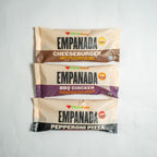 Three packages of Empanada snacks from Clean Eatz on a white background