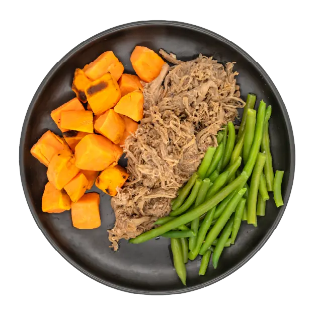 Shredded beef with green beans and roasted sweet potatoes on a black plate.