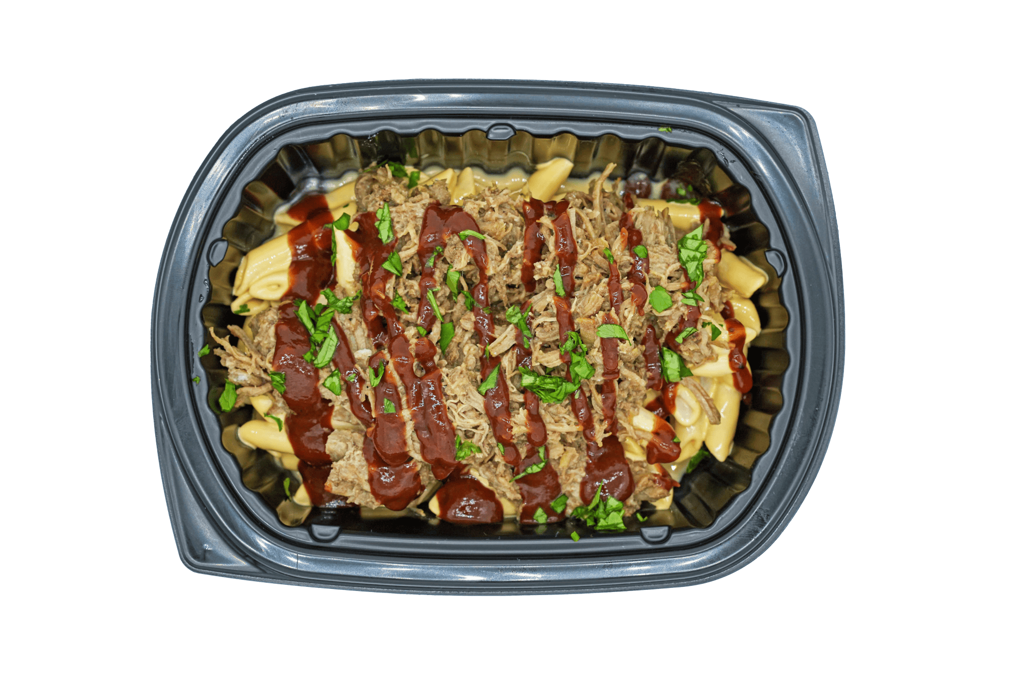 Prepared dish with meat and vegetables in a black plastic container on a green background