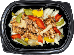 BBQ chicken with peppers and onions over pasta in a creamy alfredo sauce in a black meal tray.