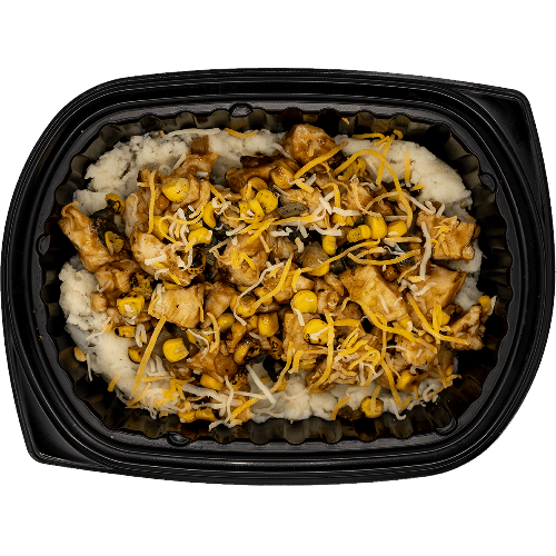 BBQ-style chicken with corn, veggies, and shredded cheese over mashed potatoes in a black meal tray.