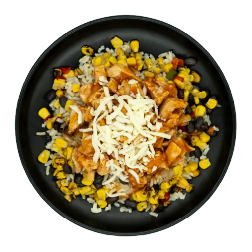 Diced chicken breast in sweet chili sauce with corn, black beans, and mozzarella cheese over brown rice on a black plate.