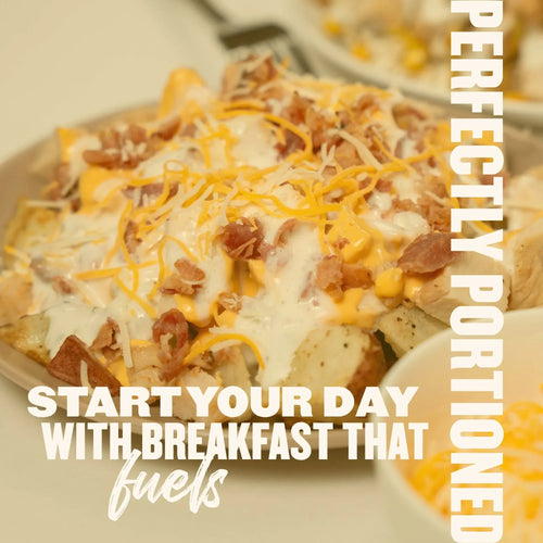 Breakfast bowl with roasted potatoes, chicken, bacon, and cheese sauce from the breakfast meal plan