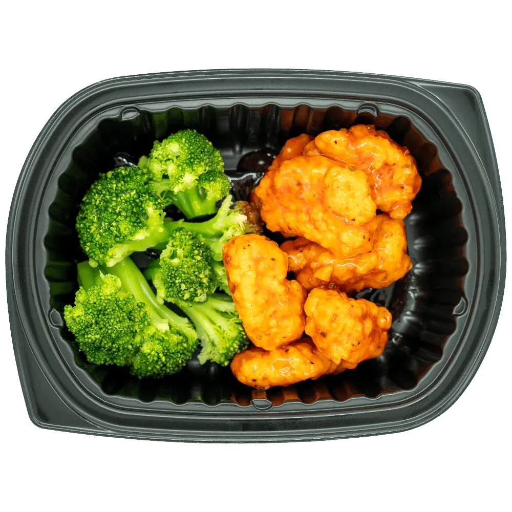 Filling prepared entree with pulled protein over grain base