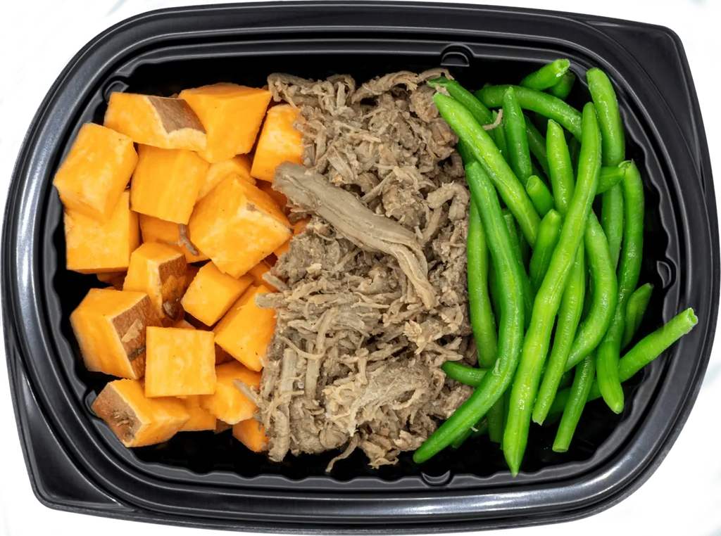 Vibrant meal tray with teriyaki-glazed protein and greens