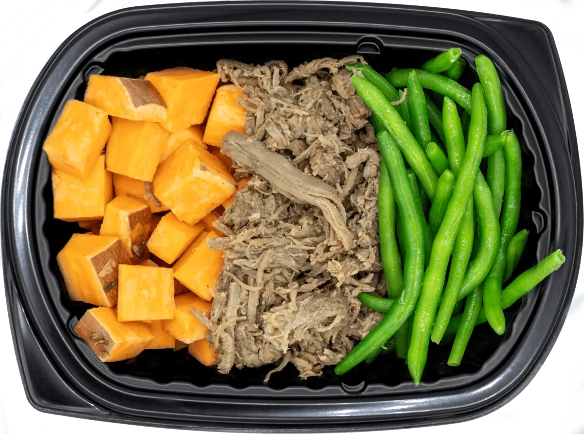 Vibrant meal tray with teriyaki-glazed protein and greens
