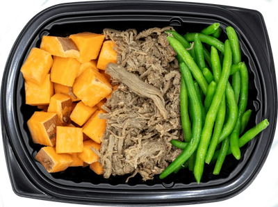 Vibrant meal tray with teriyaki-glazed protein and greens