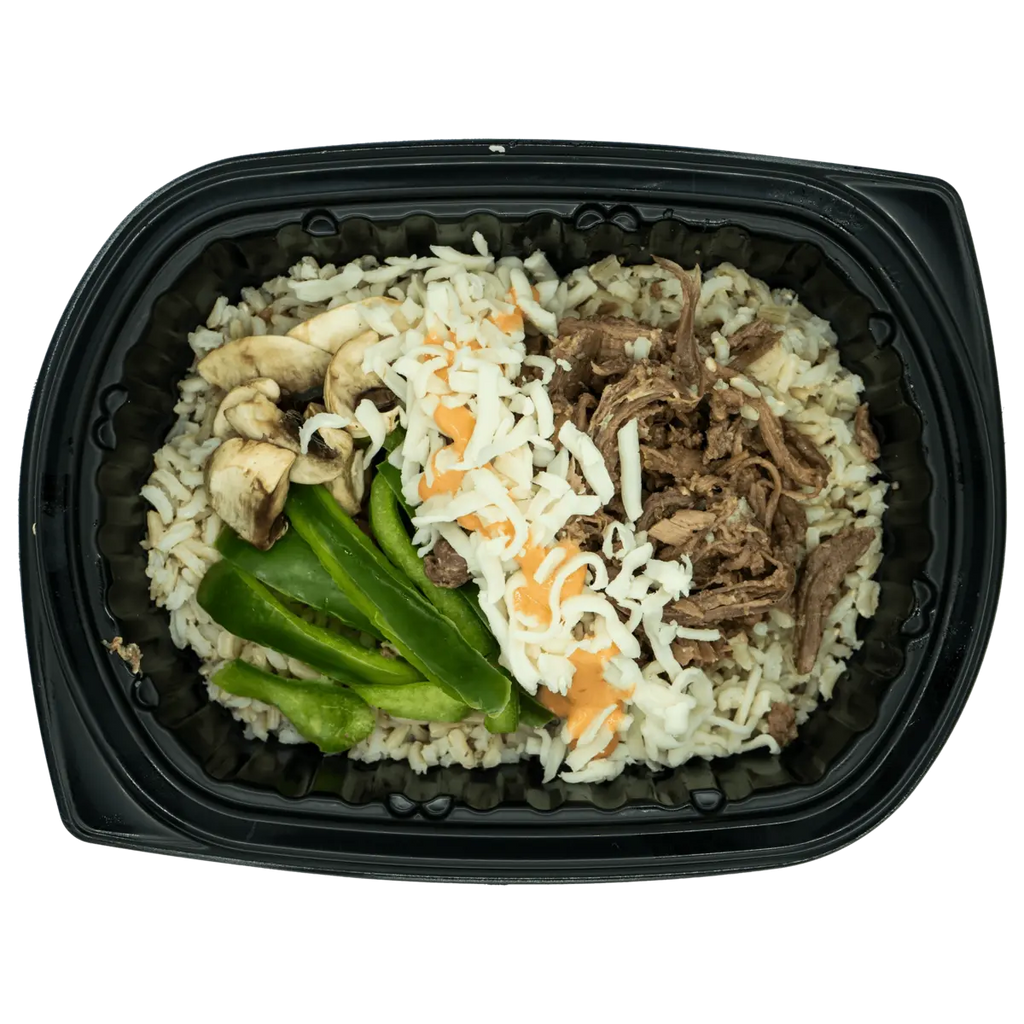 Savory prepared bowl with marinated protein and rice