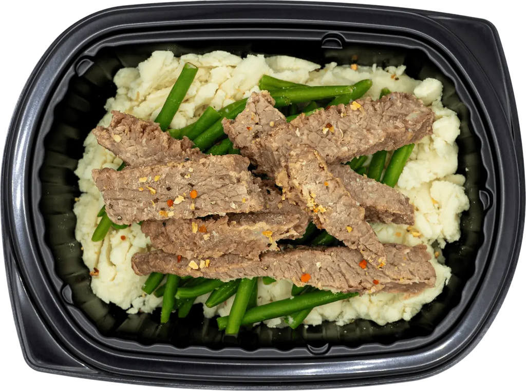 Well-balanced entree with glazed protein and steamed grains