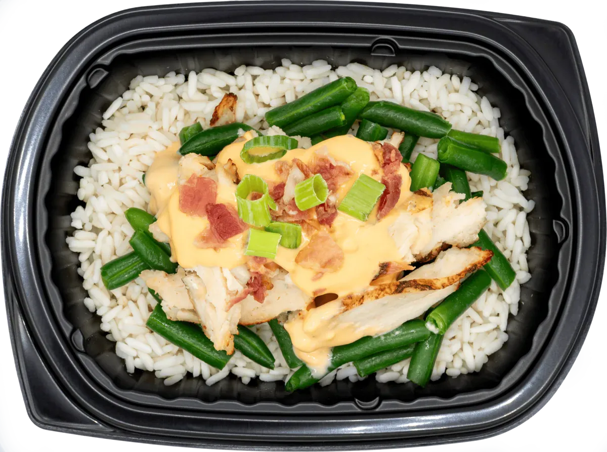 Freshly prepared meal with seasoned protein and side dishes