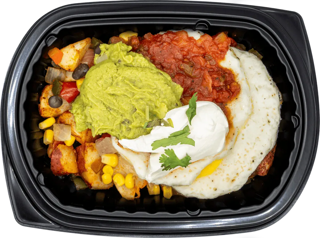 Complete portioned entree with roasted protein and starches
