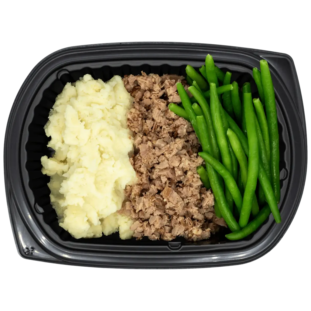 Black plastic container with mashed potatoes, ground meat, and green beans on a white background