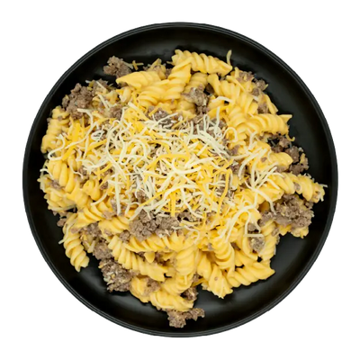 Ground beef over rotini pasta topped with shredded cheese on a black plate.