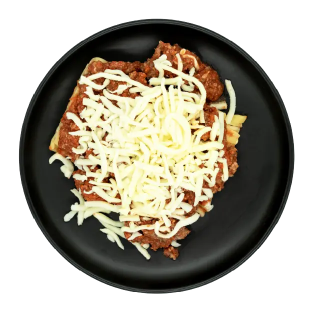 Chicken sausage lasagna with marinara sauce and shredded mozzarella cheese on a black plate.