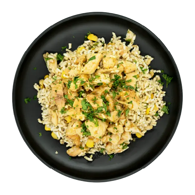 Cilantro lime chicken with corn over rice in a black meal tray.
