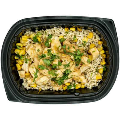 Cilantro lime chicken with corn over rice in a black meal tray.