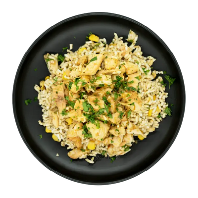 Cilantro chicken with corn over rice on a black plate.
