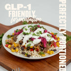 GLP-1-friendly meal with shredded beef, brown rice, black beans, corn, and pickled onions, portion-controlled