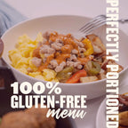 Gluten-free breakfast bowl with scrambled eggs, sausage, peppers, and potatoes from the gluten-free menu