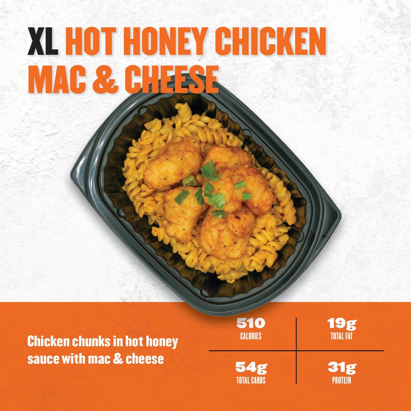 XL Hot Honey Chicken Mac & Cheese – crispy chicken chunks drizzled with hot honey sauce over creamy macaroni and cheese in a black container.
