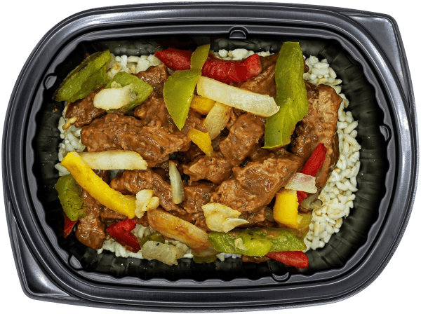 Steak strips with sautéed peppers and onions over brown rice in a black meal tray.