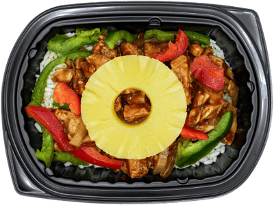 Hawaiian-style chicken dish with pineapple and vegetables in a black container