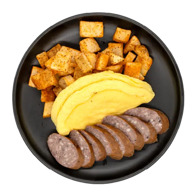 Sliced sausage with folded eggs and seasoned breakfast potatoes on a black plate.