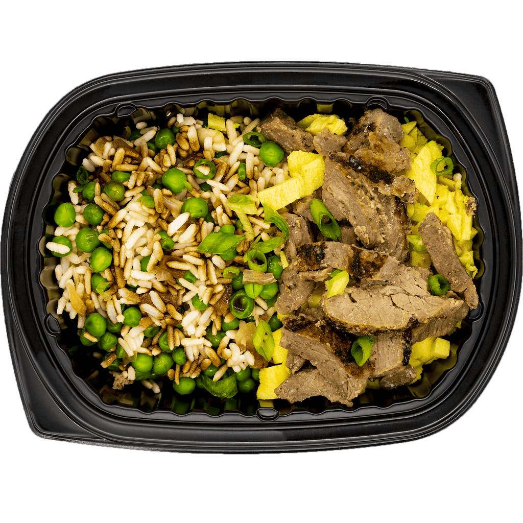 Steak and egg hibachi bowl with fried rice and vegetables