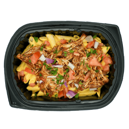Shredded BBQ chicken over mac and cheese topped with diced tomatoes, red onions, and herbs in a black meal tray.