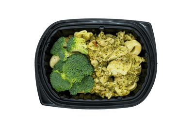 Creamy pesto tortellini with chicken and broccoli in a black meal tray.