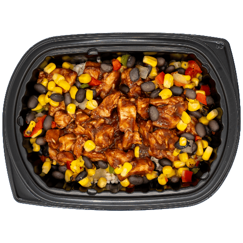 Diced chicken in a sweet chili-style sauce with corn, black beans, and peppers over rice in a black meal tray.