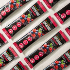 Superfood mixed berry packs arranged in a grid on a white background